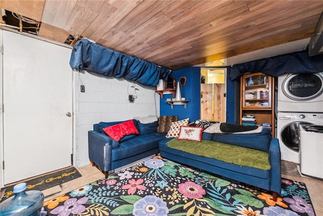 living room with stacked washer / drying machine and wood ceiling