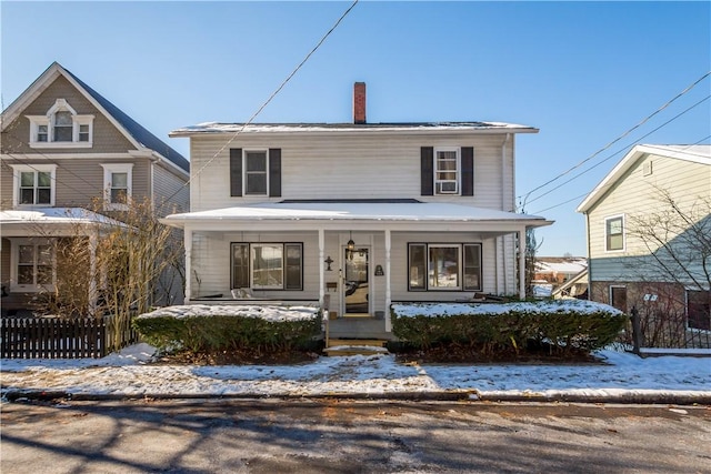 view of property featuring a porch