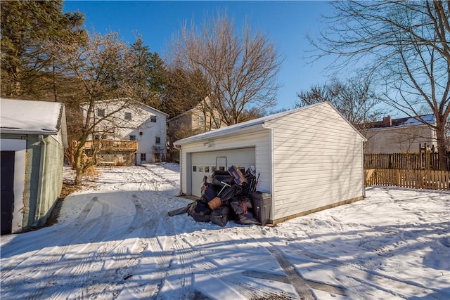 view of snow covered garage