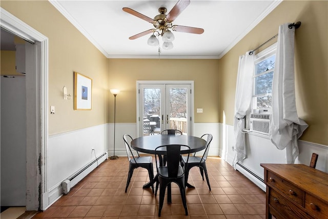 tiled dining room featuring french doors, a baseboard radiator, ceiling fan, and ornamental molding