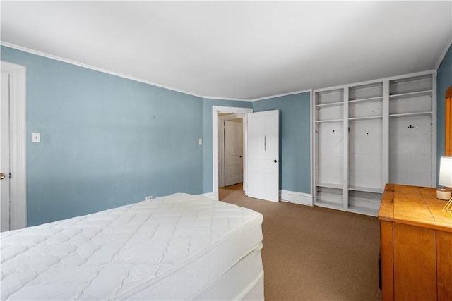 bedroom featuring ornamental molding and carpet flooring