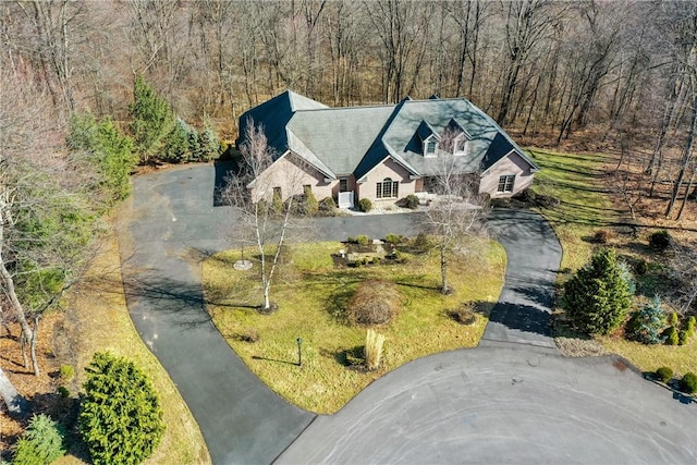 drone / aerial view with a view of trees