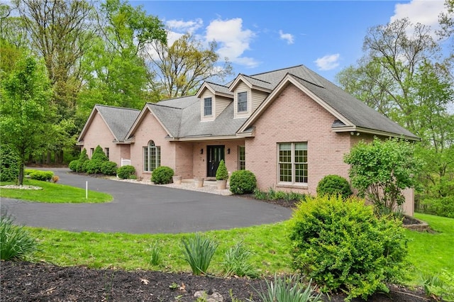 145 Cedar Rdg, Center Twp But, PA 16001 - view of front of property featuring brick siding and a front lawn