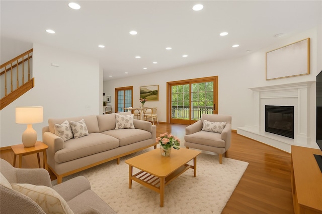 145 Cedar Rdg, Center Twp, PA 16001 - living area with light wood-style floors, recessed lighting, stairs, and a glass covered fireplace