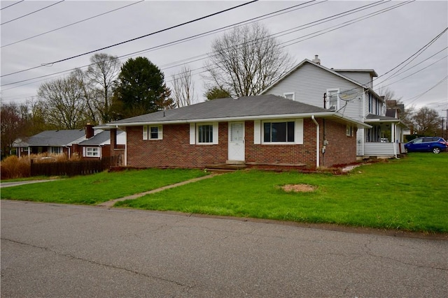 view of front facade with a front lawn