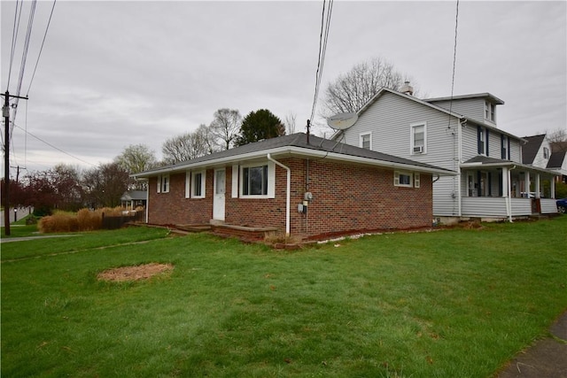 view of property exterior featuring a yard