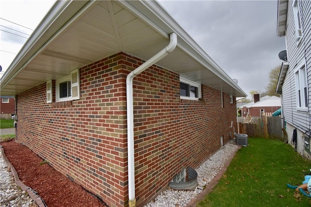 view of side of property featuring a yard