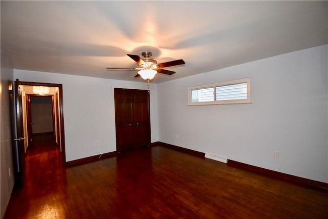 unfurnished bedroom with a closet, ceiling fan, and dark hardwood / wood-style floors