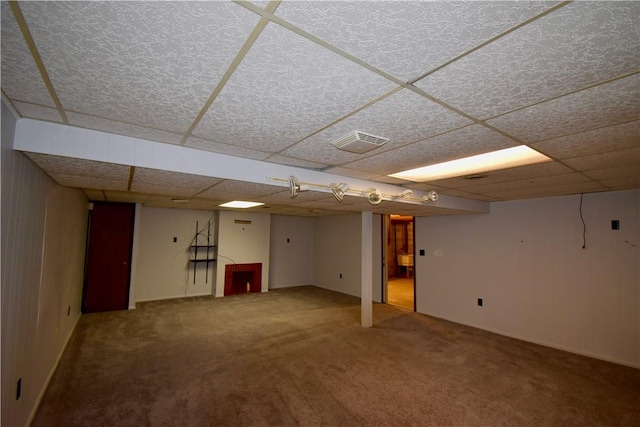 basement featuring carpet flooring