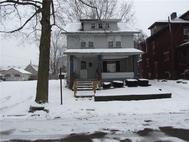 view of property with covered porch