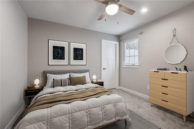 carpeted bedroom featuring ceiling fan