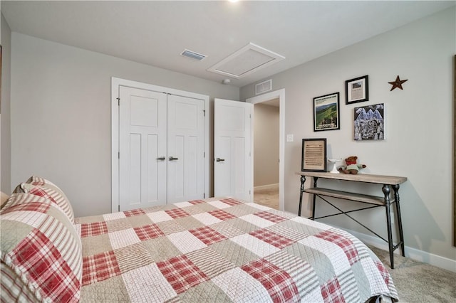 carpeted bedroom featuring a closet