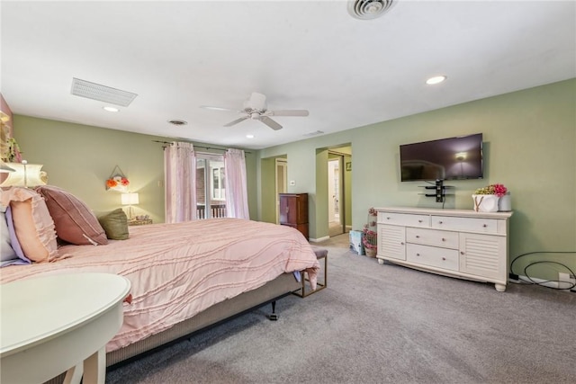 bedroom with light colored carpet and ceiling fan