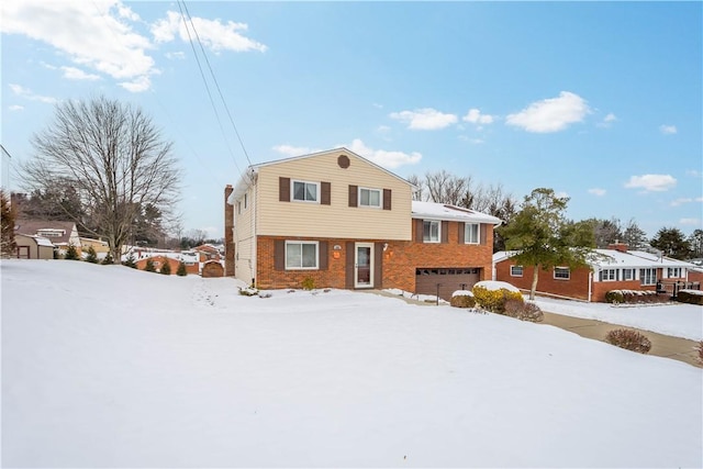 split level home with a garage