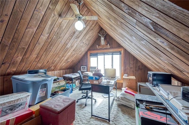 home office with lofted ceiling, wooden ceiling, ceiling fan, and light carpet