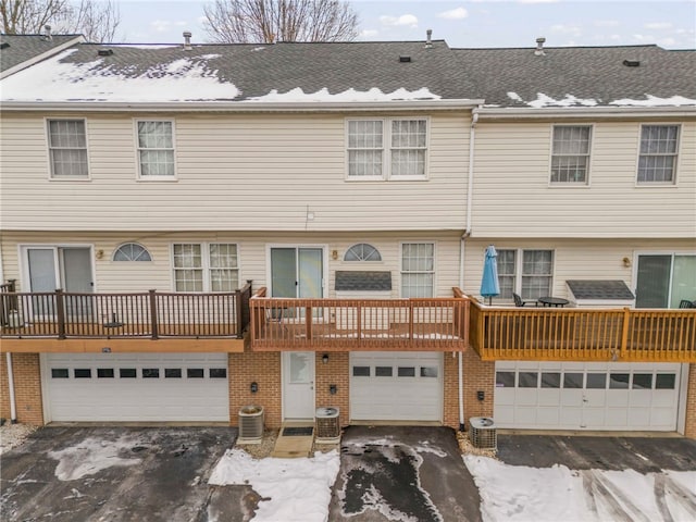 multi unit property with a garage and central AC