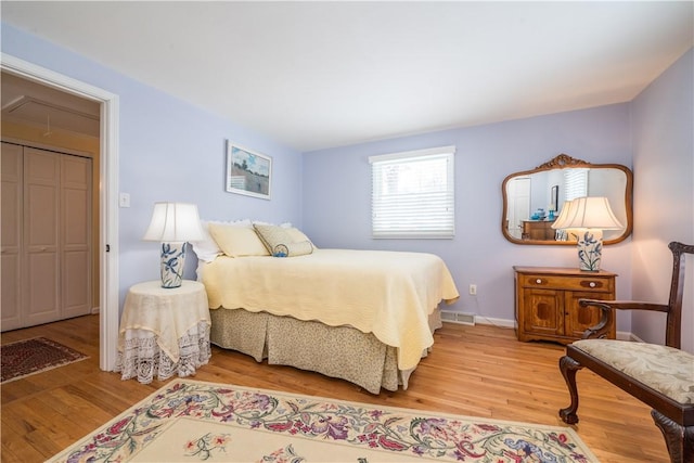 bedroom with wood-type flooring