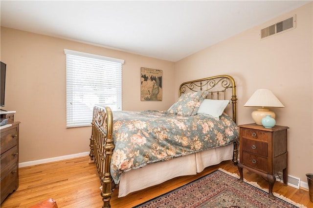 bedroom featuring light wood-type flooring