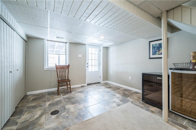 interior space with visible vents and baseboards