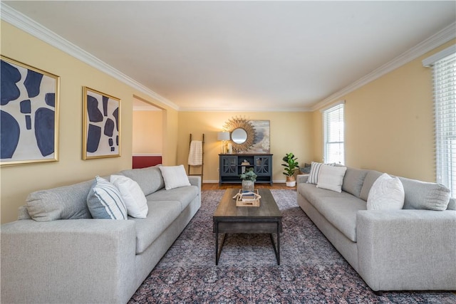 living room with crown molding and wood finished floors