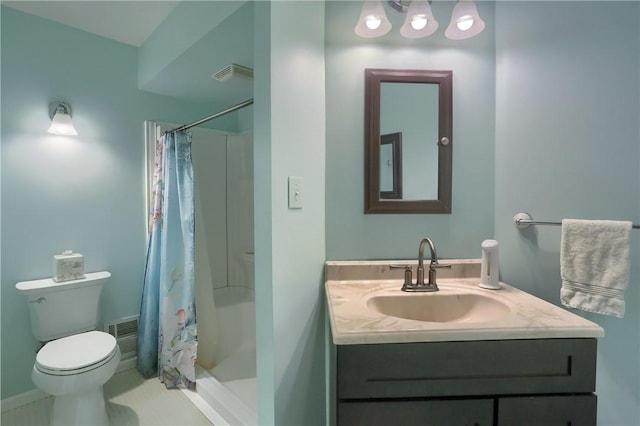 bathroom with curtained shower, vanity, and toilet