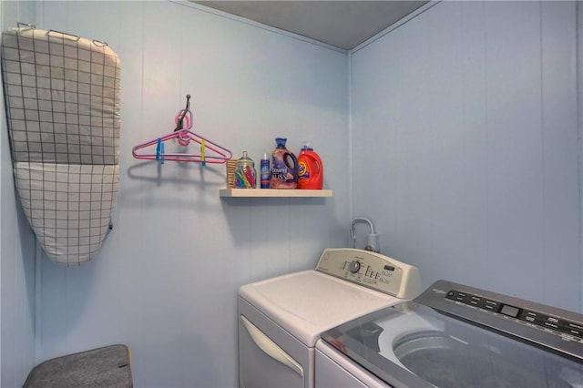 laundry area featuring washing machine and dryer