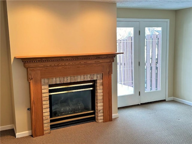 details featuring a fireplace and carpet