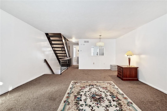 interior space featuring dark colored carpet