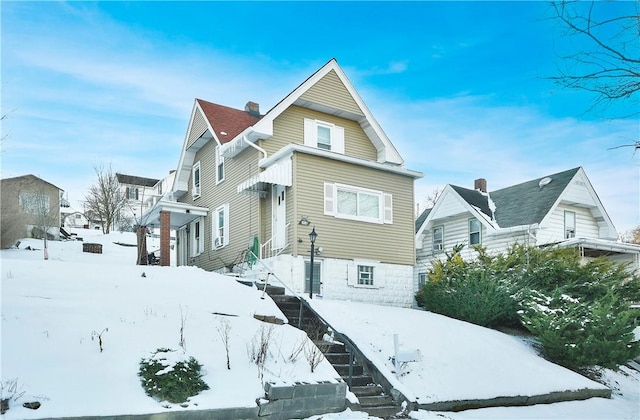 view of snow covered property