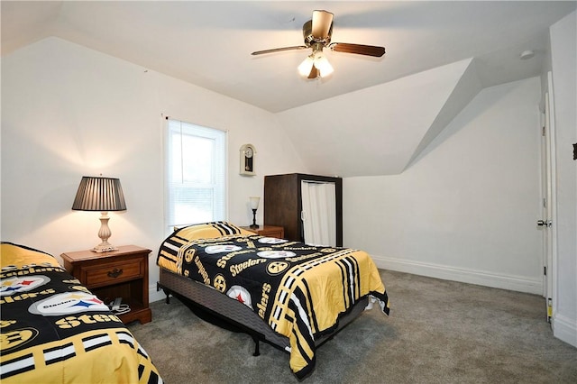 bedroom featuring lofted ceiling, carpet flooring, and ceiling fan