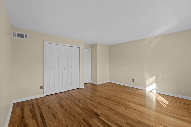 unfurnished bedroom featuring light hardwood / wood-style flooring