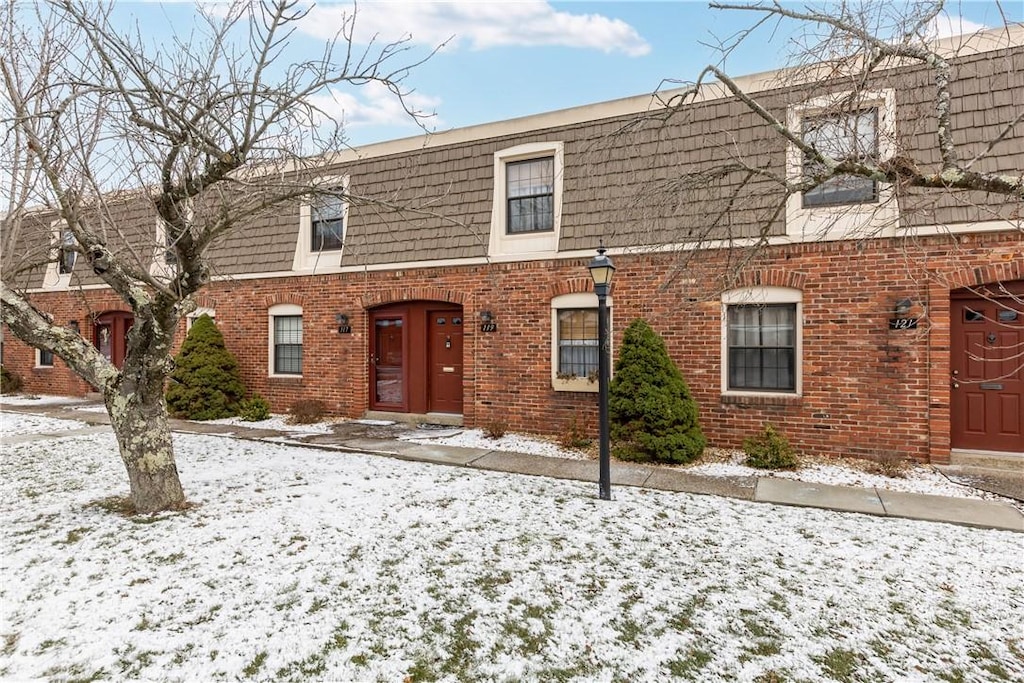 119 Community Ct, Pennsbury, PA 15205 - view of front of house with mansard roof and brick siding