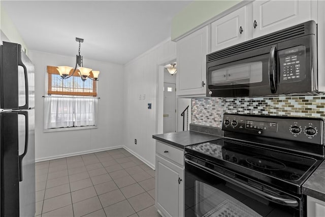 kitchen with a notable chandelier, black appliances, backsplash, white cabinets, and light tile patterned flooring