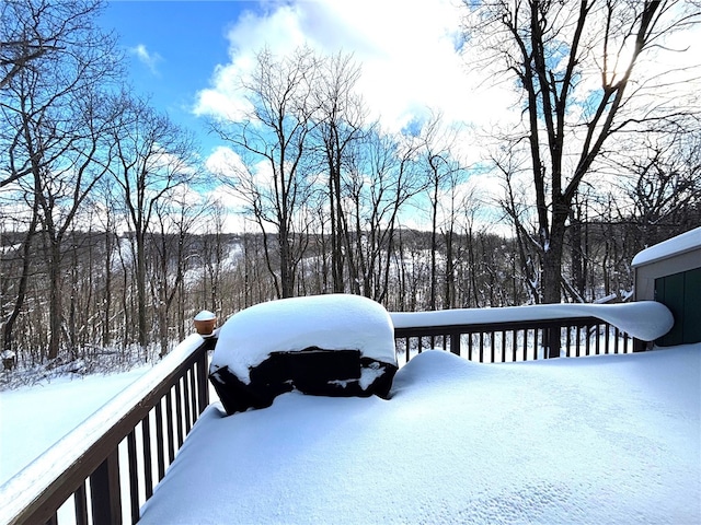 view of snow covered deck