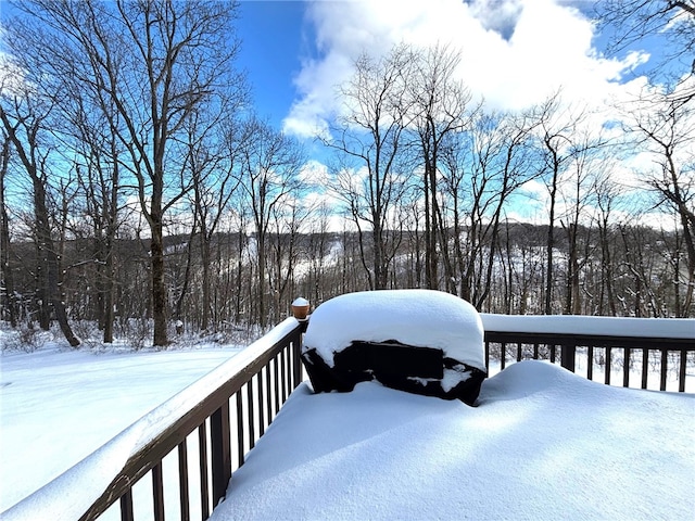 view of snow covered deck