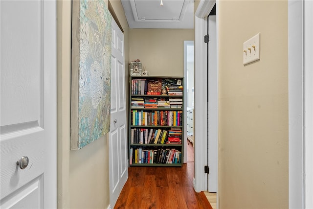 corridor featuring hardwood / wood-style flooring