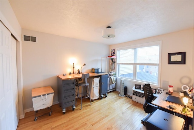 office featuring light hardwood / wood-style floors