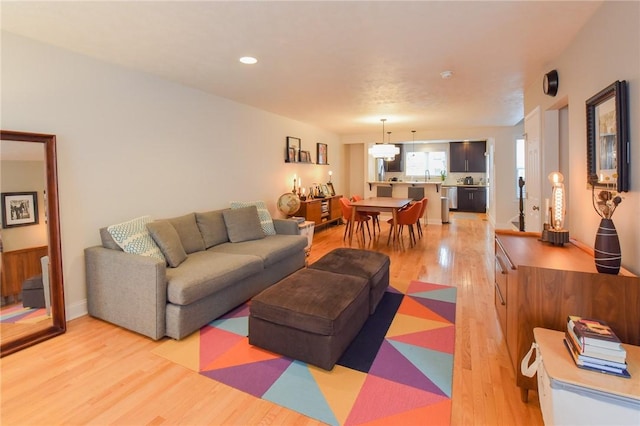 living room featuring light wood-type flooring