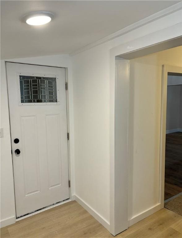 foyer with light wood-type flooring