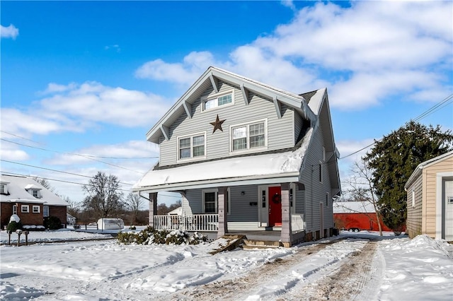 front of property featuring covered porch