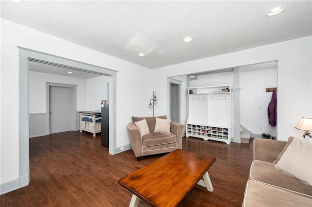 living room with dark hardwood / wood-style floors