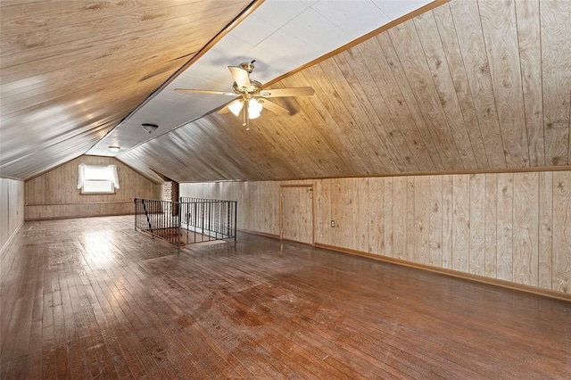 additional living space with lofted ceiling, hardwood / wood-style flooring, and wooden ceiling