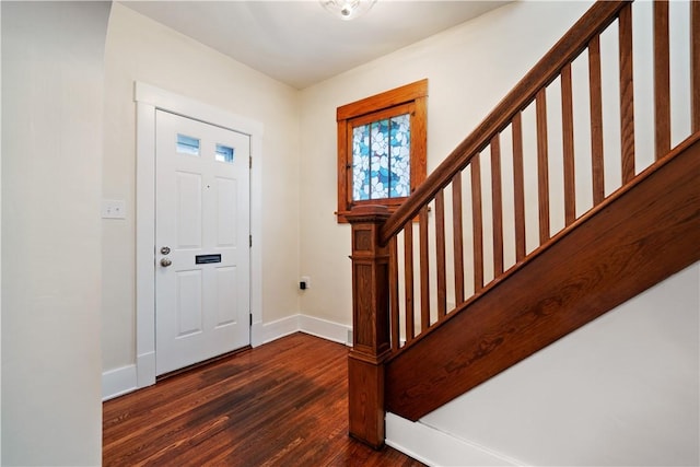 entrance foyer featuring dark wood-type flooring