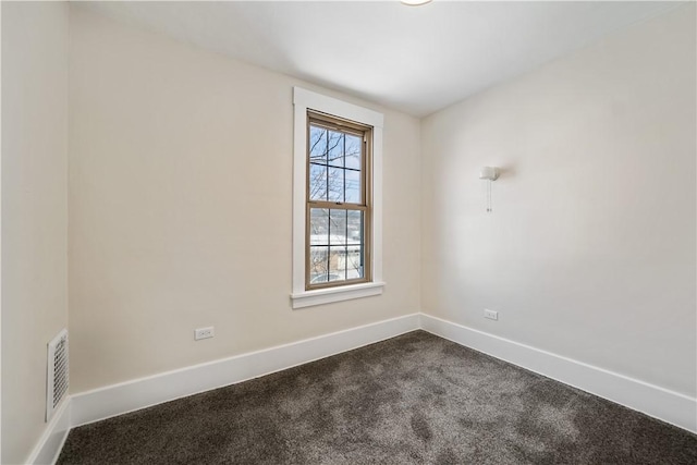 unfurnished room with carpet flooring