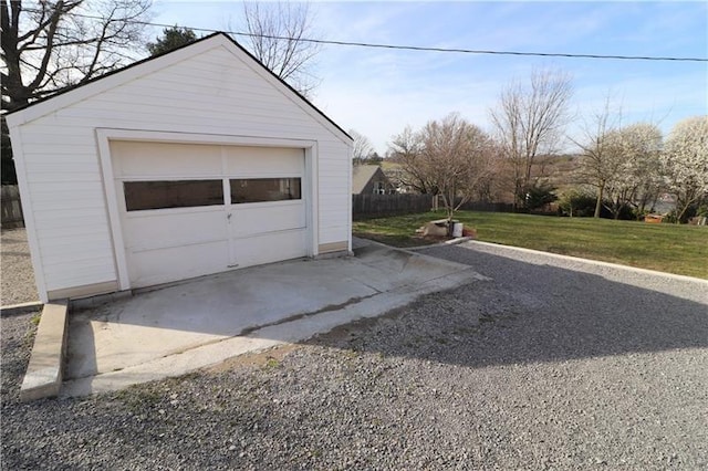 garage with a lawn