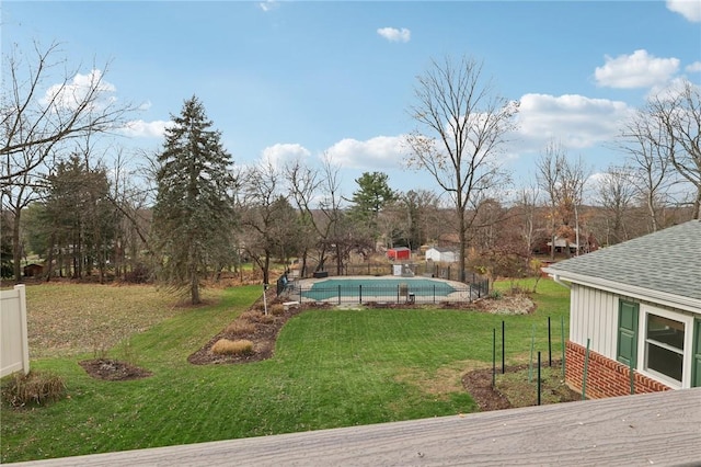 view of yard featuring a covered pool