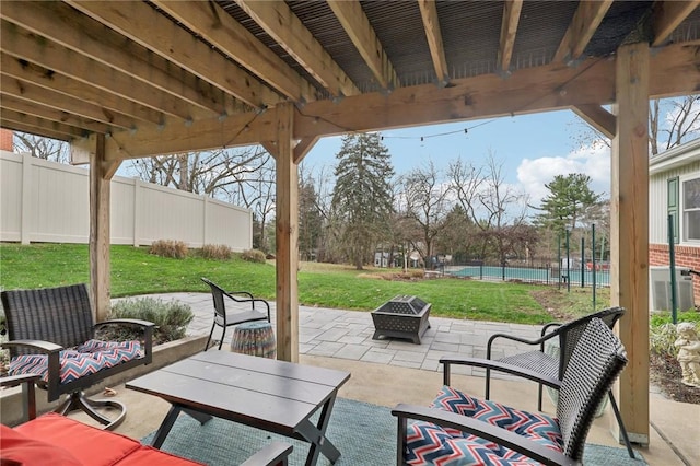 view of patio / terrace with an outdoor fire pit and central air condition unit