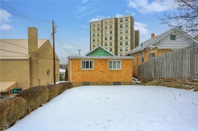 view of snow covered property