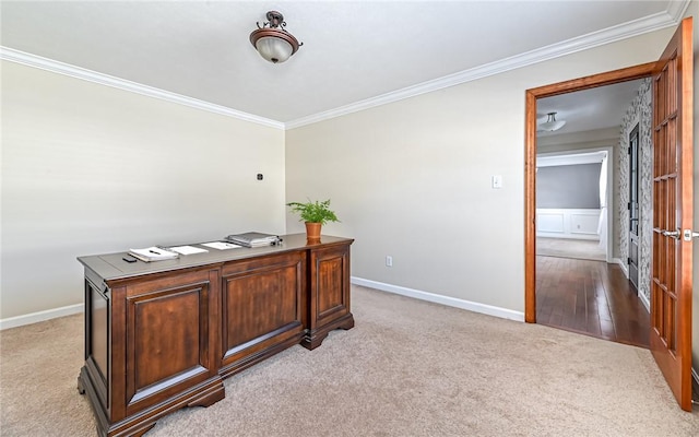 carpeted office space with crown molding