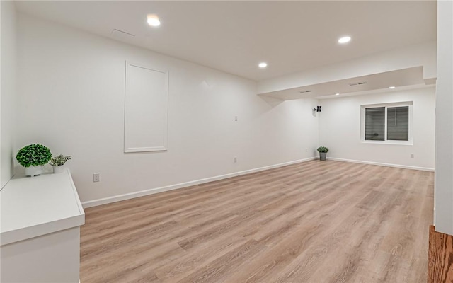 basement with light wood-type flooring